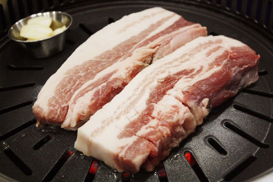 Samgyeopsal, or “fatty pork belly” is a popular style of Korean cooking