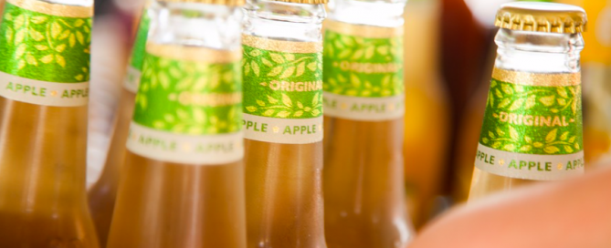 Chilled bottles of hard cider. chilled hard cider