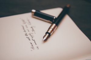 fountain pen and notepad