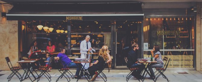 A restaurant hostess or host is the one that greets customers and accommodate their inquiries